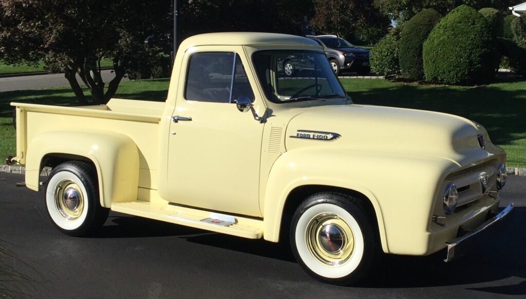 Yellow Ford F100 pck up truck