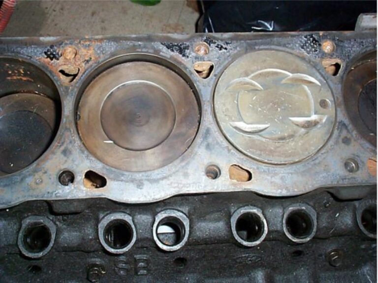 Engine with factory piston and modified piston