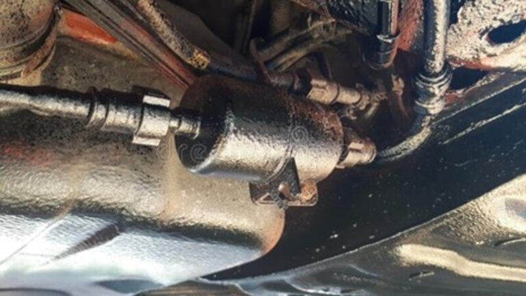 Under car fuel filter connected to fuel line