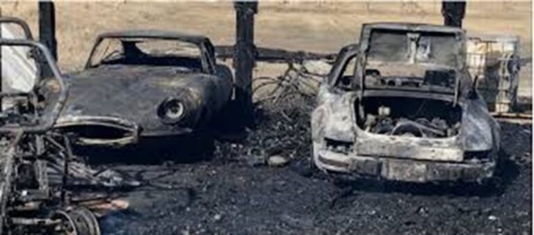 Fire damaged Porsche and Jaguar classic cars