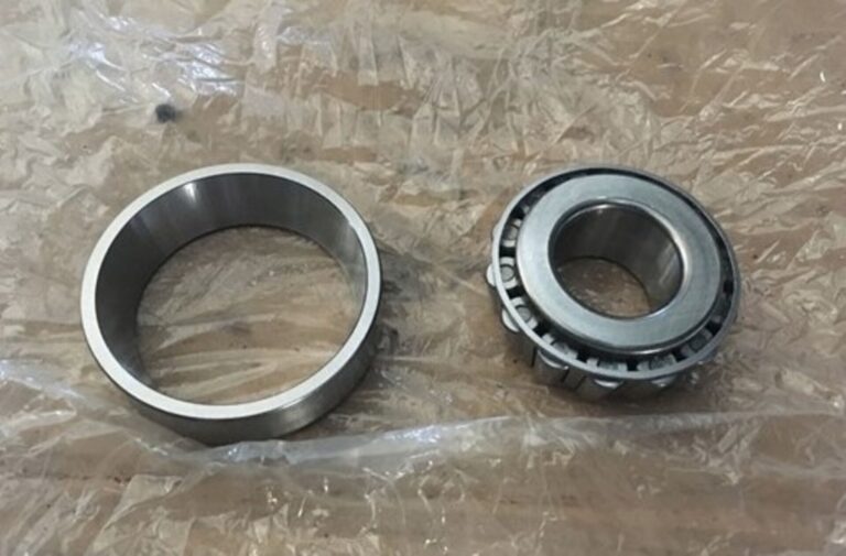 Front wheel bearing and race