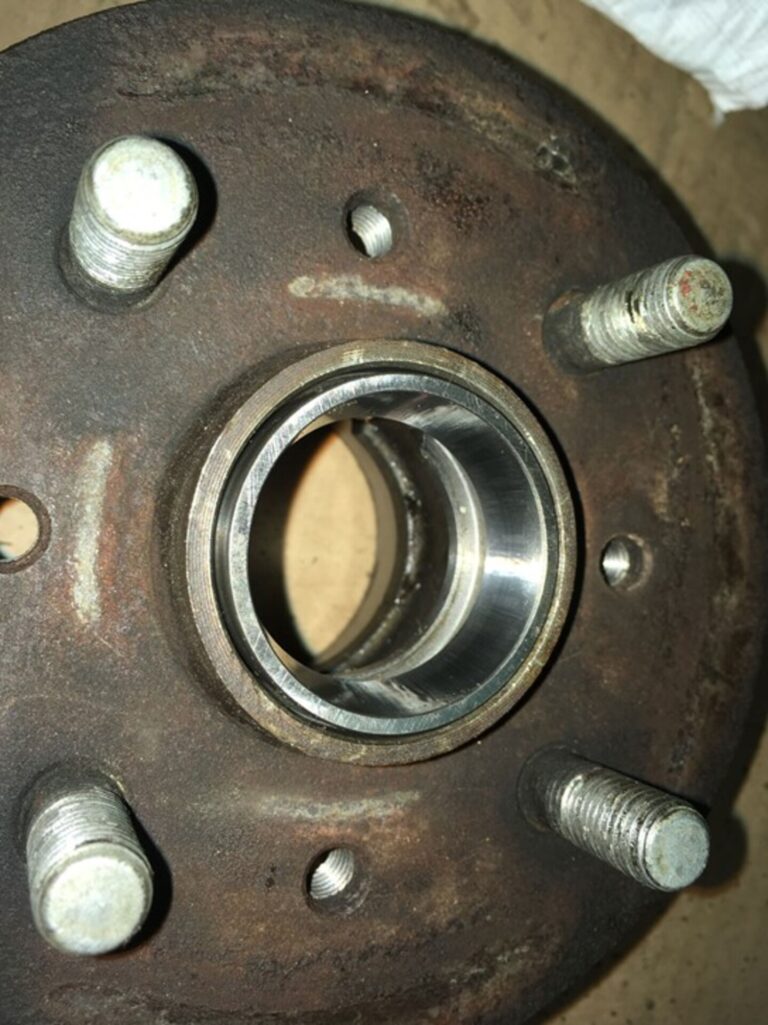 Pressing wheel bearing race onto hub