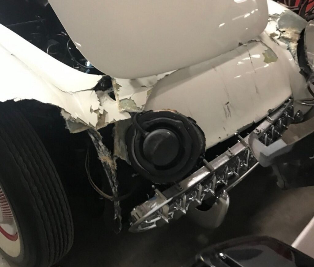 Damaged Corvette front end due to restoration shop scam