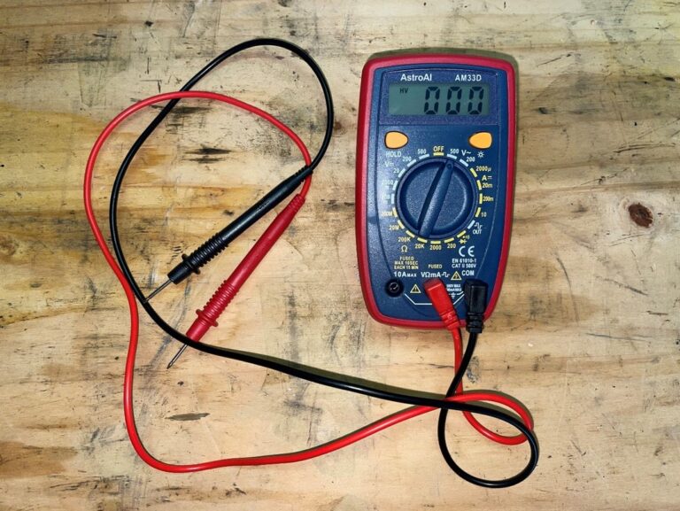 Electrical multi-meter tester on wood table