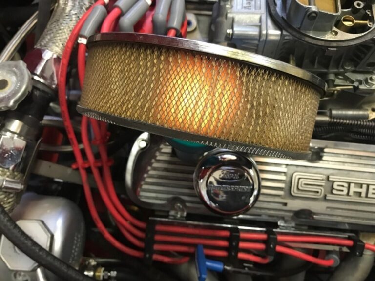 Light shining thru classic car air filter