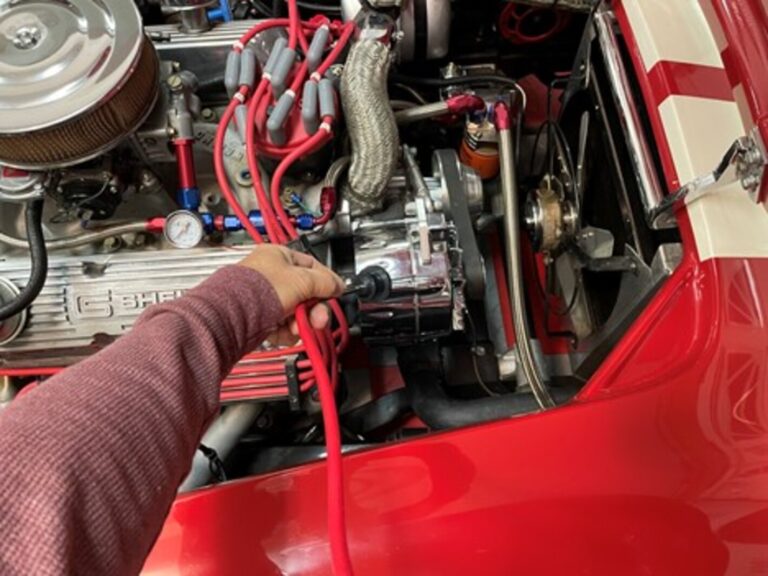 Using a stethoscope on a car engine