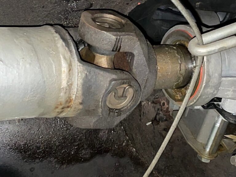 Driveshaft, u-joint, and yolk attached to transmission