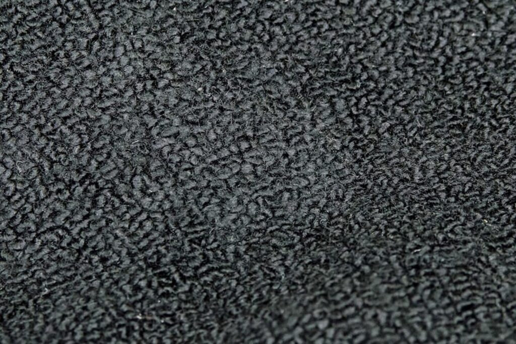 The finished carpet patch in the car carpet repair
