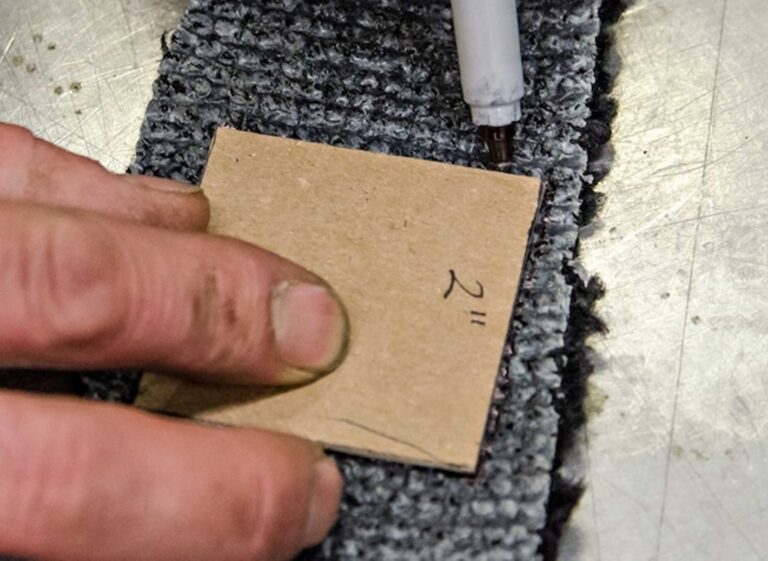 Measuring a carpet patch for carpet repair