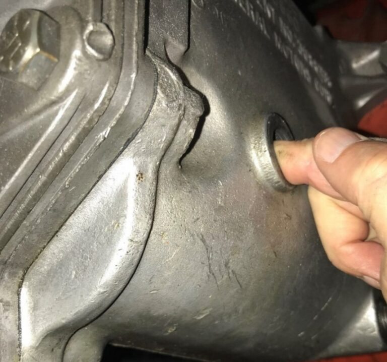 Checking a transmission fluid level with a finger