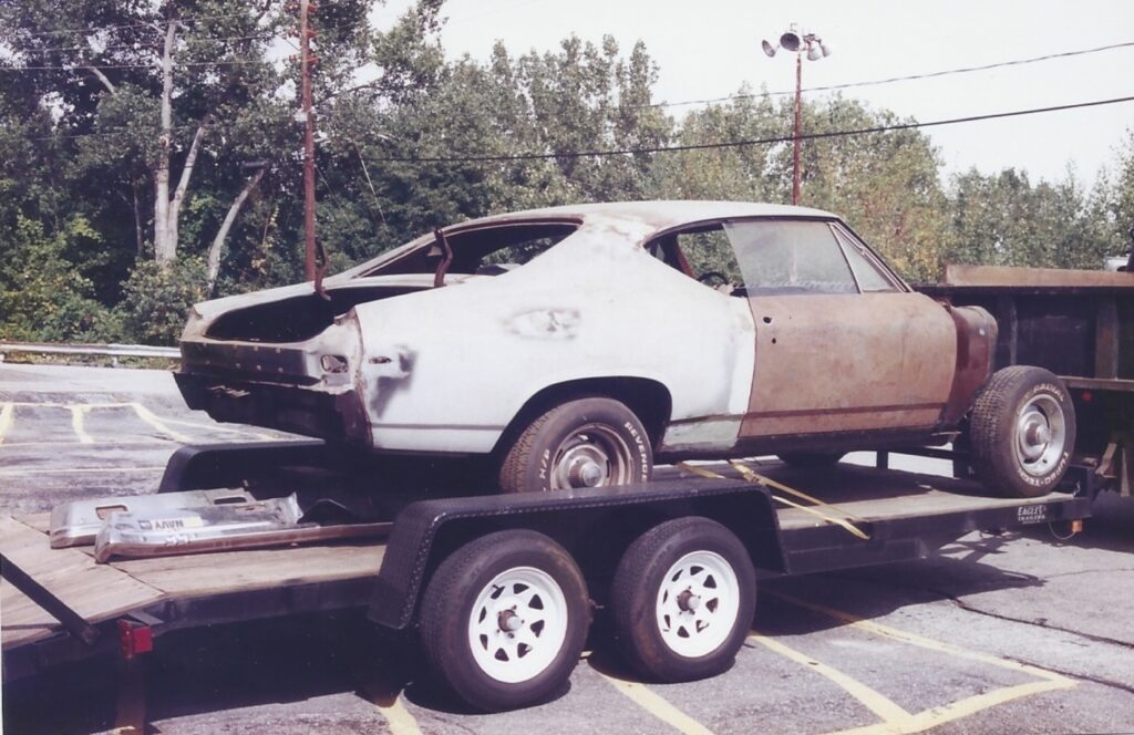 An unrestored Chevrolet Chevelle on a trailer