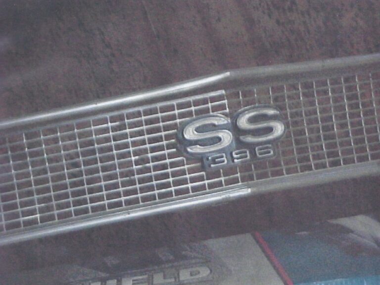 A grill from a 68 Chevelle on a table