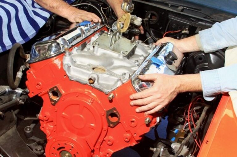 A big block engine being installed into a Chevelle