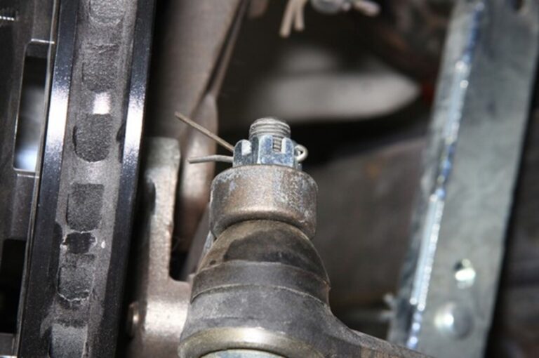 Improper cotter pin installation on car steering knuckle
