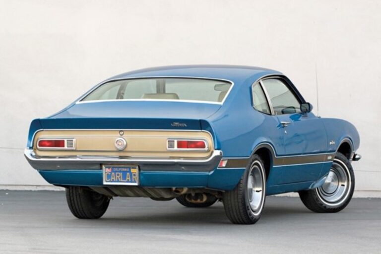 A rear view of a Ford Maverick wit hits front wheels turned to the right