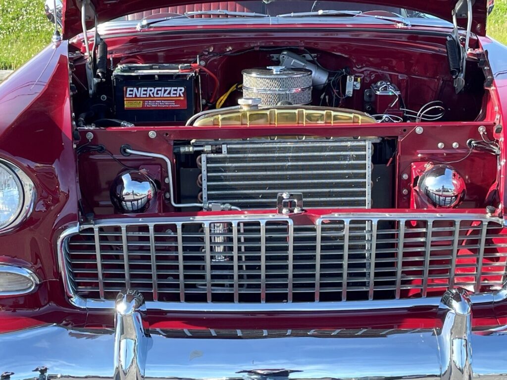Grill and radiator on a red 57 Chevy