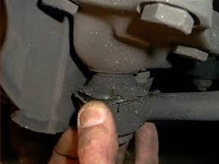 A worn tie rod end causing steering alignment issues