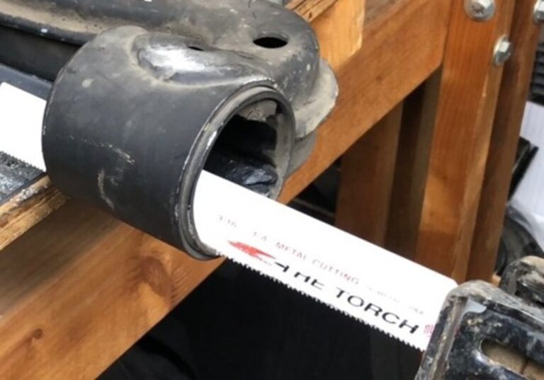 Using a Sawzall to cut a bearing sleeve
