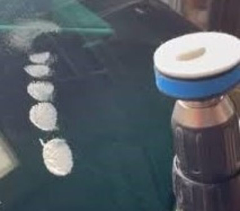 Glass polish on a windshield with a polisher