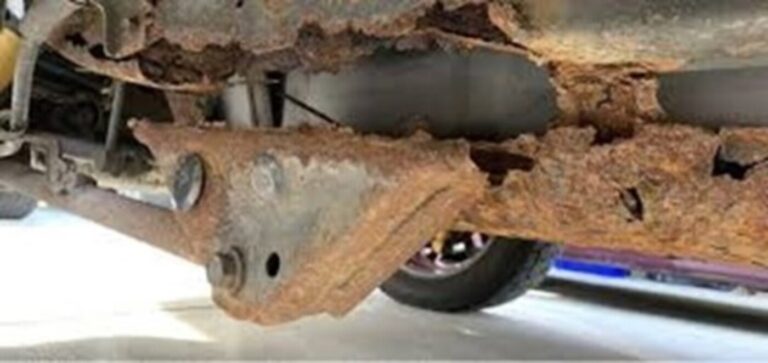 Structural rust that has deteriorated a car frame