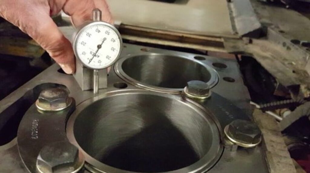 Measuring deck height on after sleeving an engine