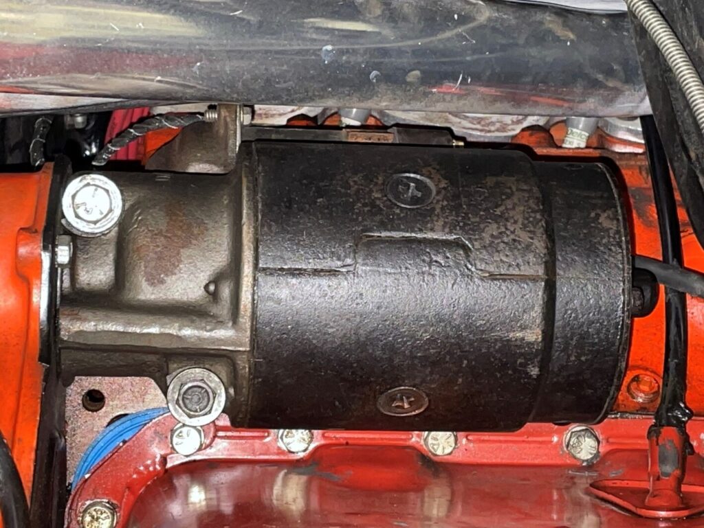A Chevrolet bid block engine with a car starter