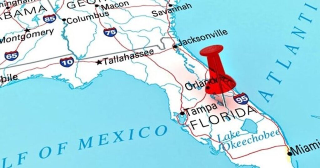 Map of Florida with red pin in the center for a hidden gem roadtrip