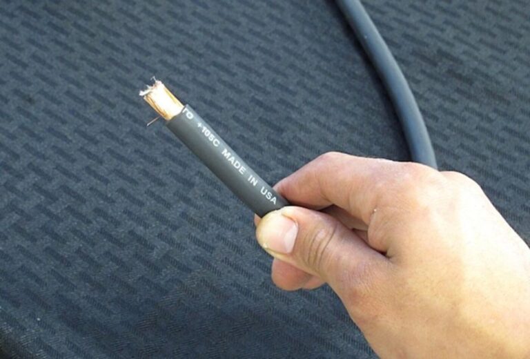 A black #1 gauge black wire that as the end shielding removed