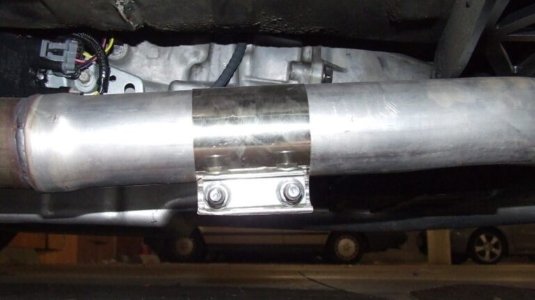A band exhaust clamp installed on an exhaust pipe