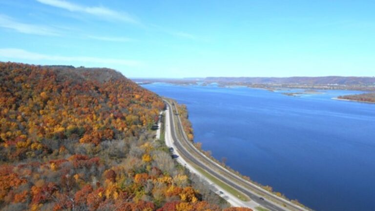 An overhead view of a highway along the lake on Minnesota's North Shore for road trips