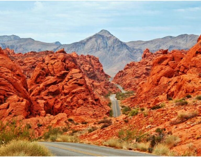 A section of I-15 in the Nevada red mountains with the winding road for a road trip