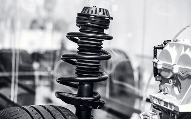 A fully assembled McPherson style front suspension components
