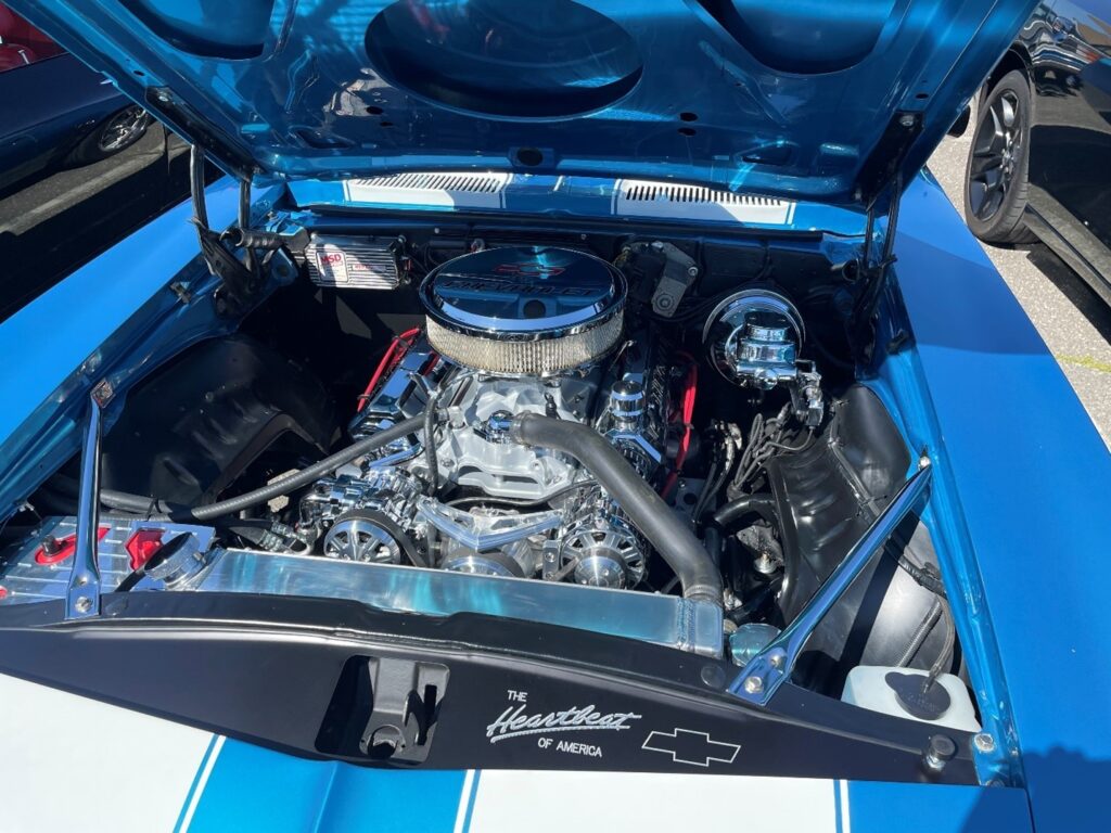 A Chevy big block 582 with chrome in a 1969 blue Camaro with updated modern tech