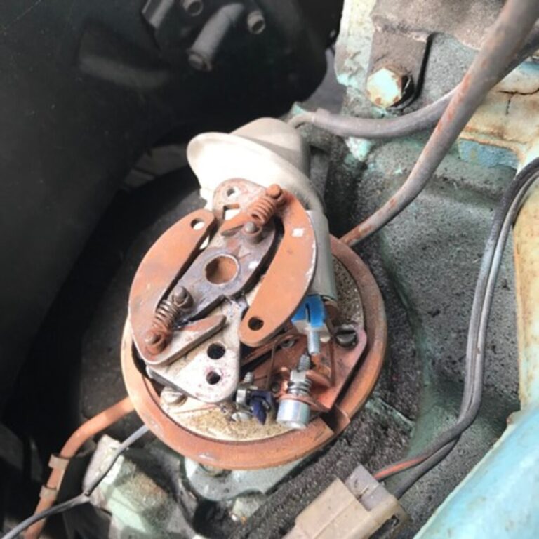 The mechanical advance of a Pontiac distributer with points as part of the engine ignition timing