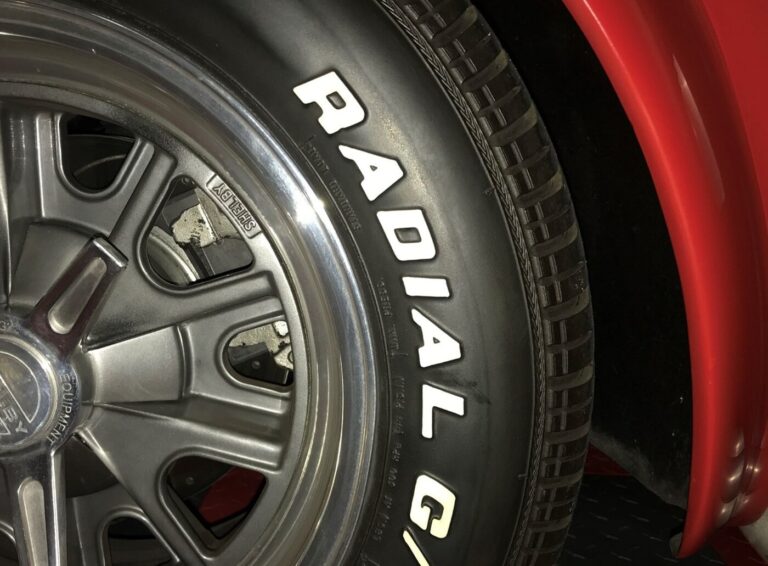 An up-close look at a Cobra wheel and tire for a car appraisal