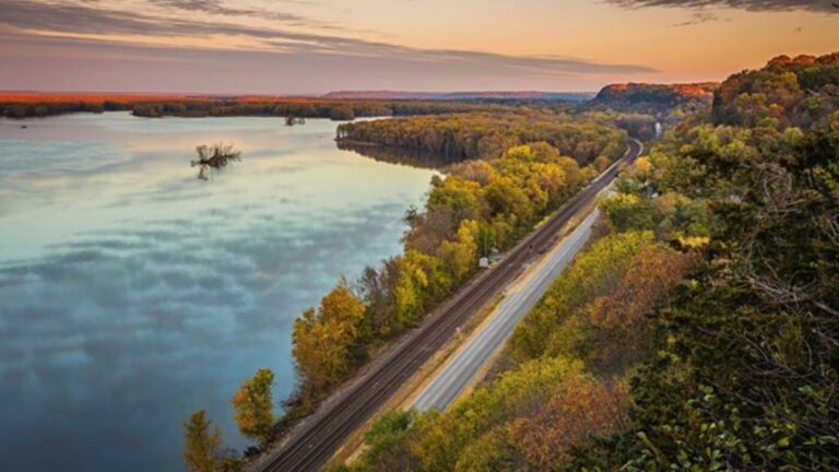A section of the Great River Road along the Mississippi river for a fall foliage road trip