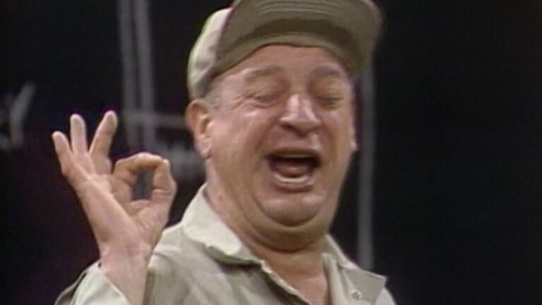 On a TV show Rodney Dangerfield making an OK symbol with his hand