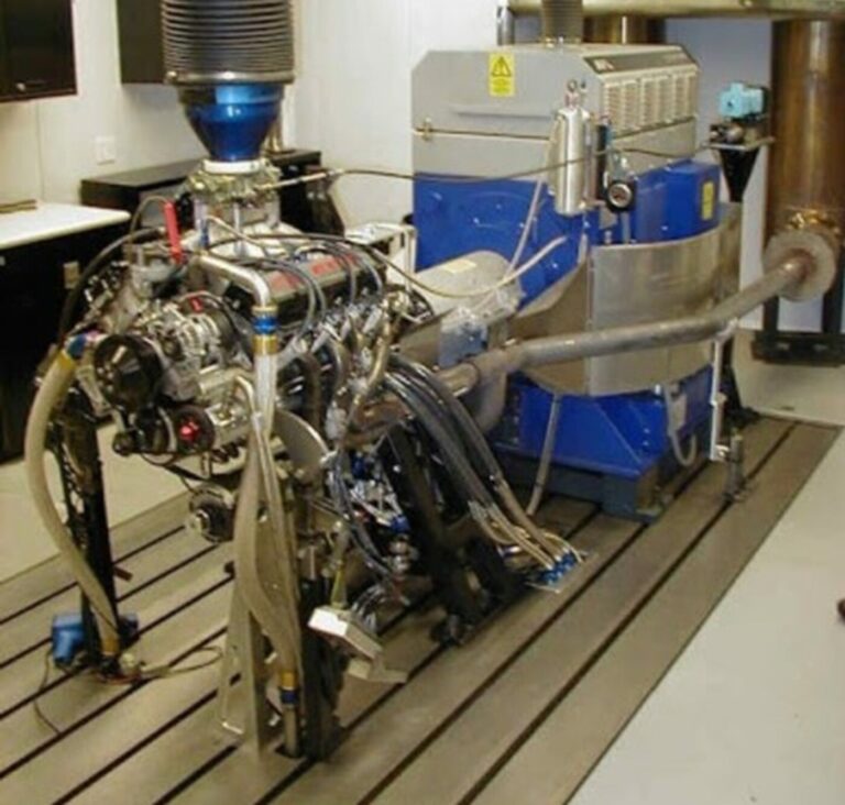 An engine moiunted to a dyno machine to test engine performance as part avoiding engine rebuilding mistakes
