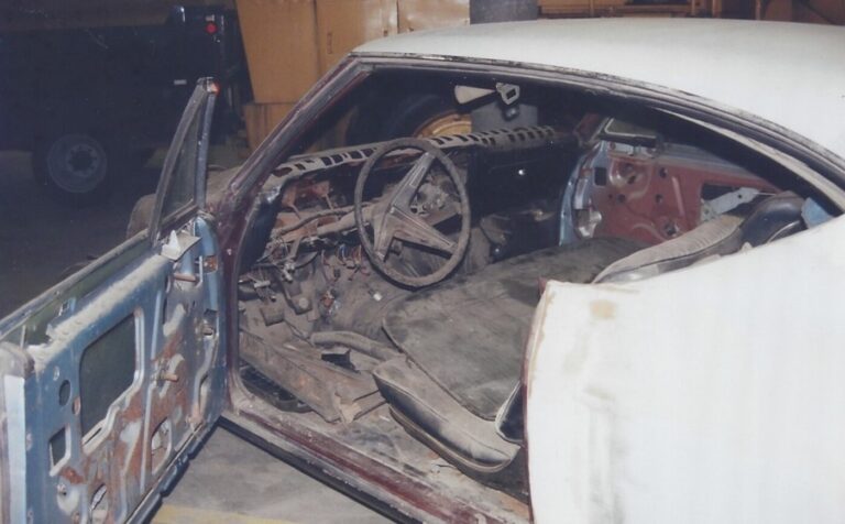 A view of a 1968 Chevy Chevelle withthe driver's door open prior to bodywork and complete restoration