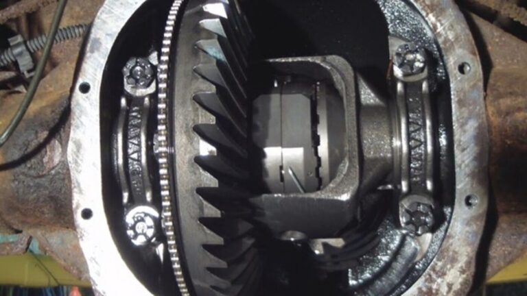 An open rear differentials case showing a locker assembly with gears installed