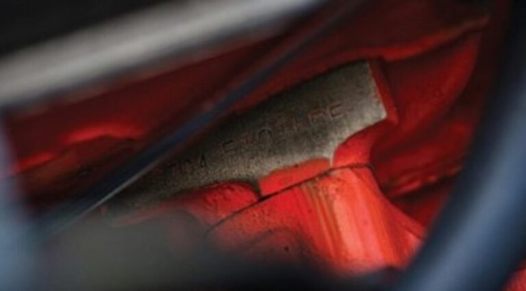 A number stamp on a car engine to dtermine if the number matches the car for numbers matching assessments