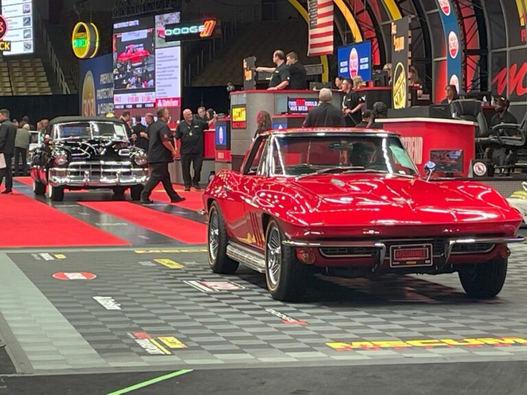 A red Chevy Corvette crossing the auction block in search of the perfect vintage car