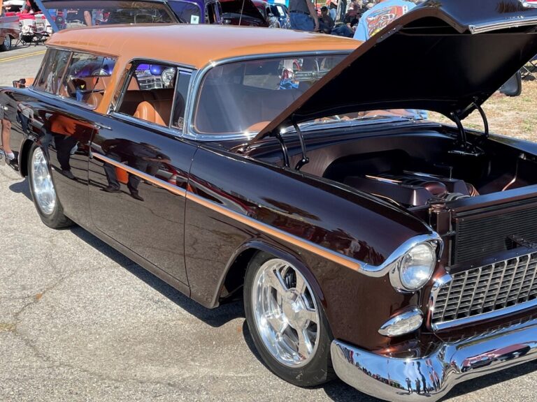 A two-tone brown 55 Chevy Belair station wagon with a modern Chevrolet LS engine