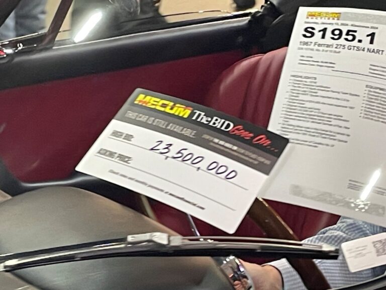 A bid goes on sticker from Mecum Auctions noting a high bid of $23,000,000 on a 1967 Ferrari 275 GTS/4